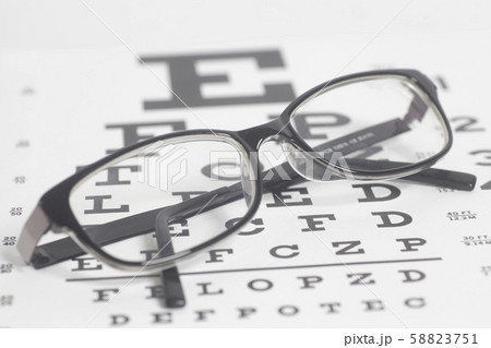 Eyeglasses on eyesight test chart 58823751
