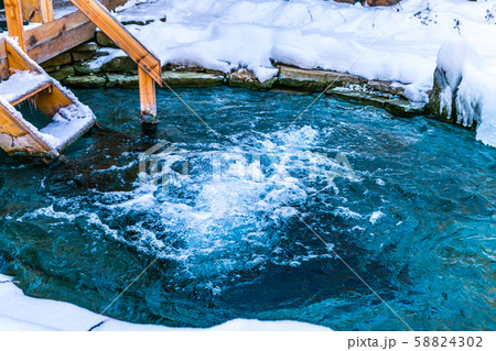Natural jacuzzi outdoors at winter.Winter season. 58824302