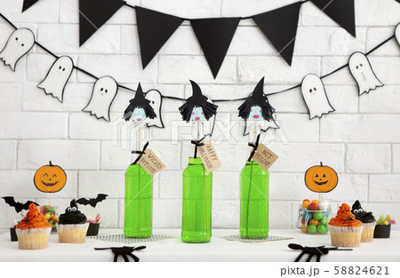 Toxic green cocktails with witches hats on Halloween party Toxic green cocktails with witches hats on Halloween party 58824621