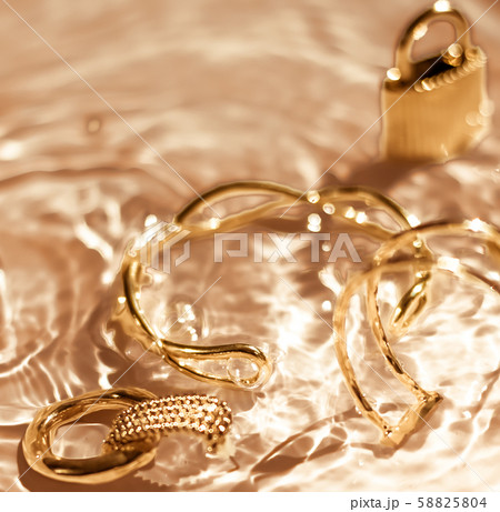Golden bracelets, earrings, rings, jewelery on Golden bracelets, earrings, rings, jewelery on 58825804
