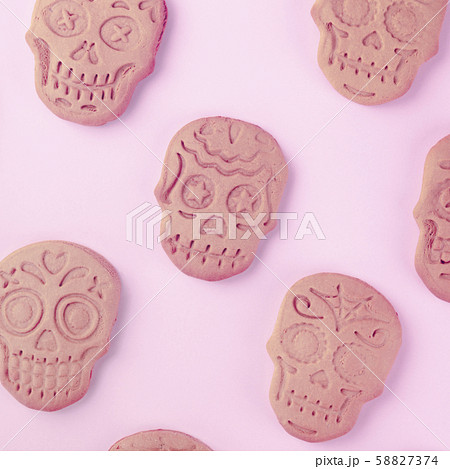 Halloween or Day of the Dead square greeting card with skull ginger cookies pattern, shot from the 58827374
