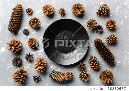 Top view of festive plate with pine cones on 58830677