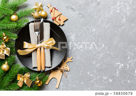 Top view of New Year dinner on festive cement 58830679
