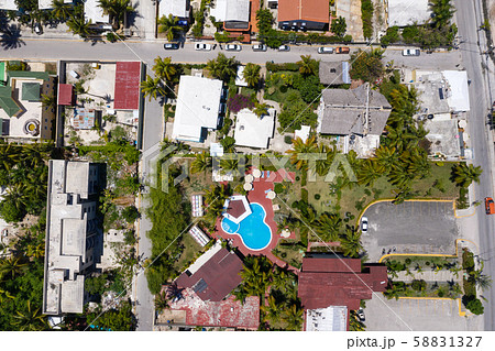 Street with houses and asphalt roads. Caribbean Street with houses and asphalt roads. Caribbean 58831327