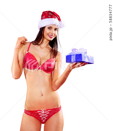 Blond Girl In Red Lingerie Posing Like A Pinup And Wearing A Santa