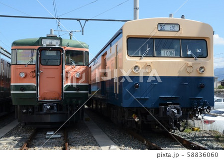 車両基地に停車中の115系とクモユニ143 車両基地に停車中の115系とクモユニ143 58836060