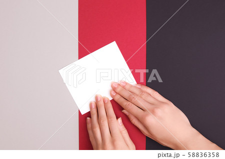 White clean sheet in beautiful woman hands 58836358