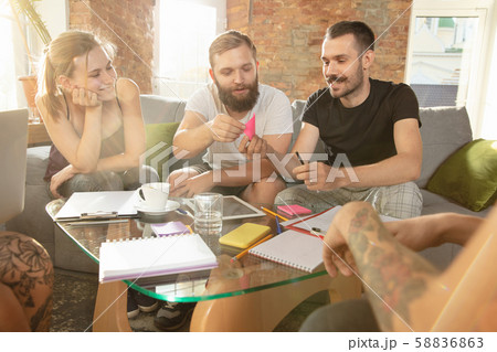 Group of young caucasian office workers have creative meeting to discuss new ideas Group of young caucasian office workers have creative meeting to discuss new ideas 58836863