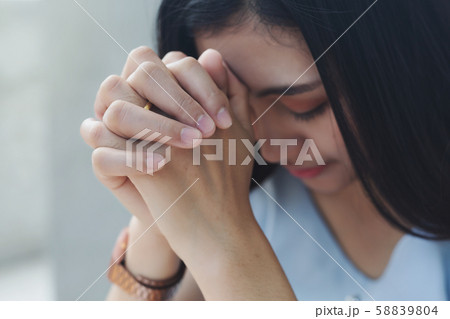 Women praying hand faith jesus promise Pray for 58839804