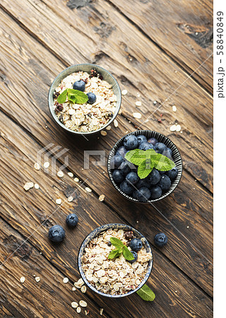 Mix of homemade cereal with blueberry and mint Mix of homemade cereal with blueberry and mint 58840849