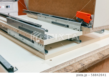 Assembly of hard furniture, close-up drawers for drawers 58842641