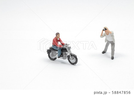 a mini figurine character as photographer standing a mini figurine character as photographer standing 58847856