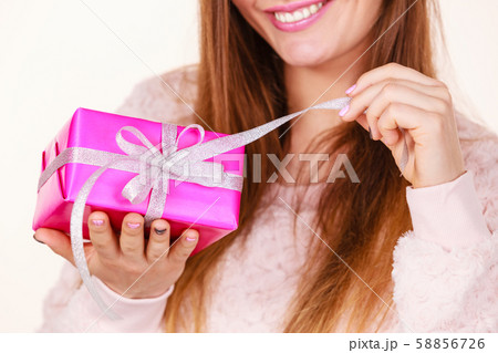 Lovely woman with pink rose box gift Lovely woman with pink rose box gift 58856726