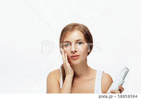 Beautiful young woman with clean perfect skin. Beautiful young woman with clean perfect skin. 58859564
