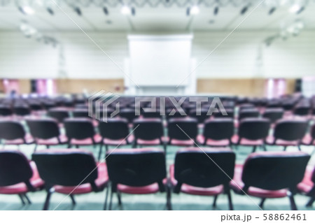 Blurred abstract background of business or educational conference and seminar in auditorium hall Blurred abstract background of business or educational conference and seminar in auditorium hall 58862461