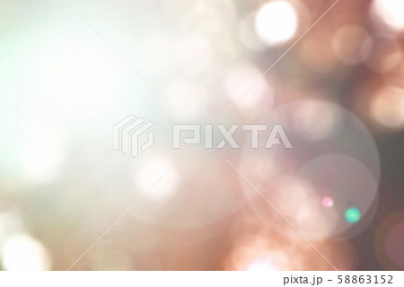 Blurred nature background with sun flare of tree looking upward in autumn orange brown tone. Blurred nature background with sun flare of tree looking upward in autumn orange brown tone. 58863152