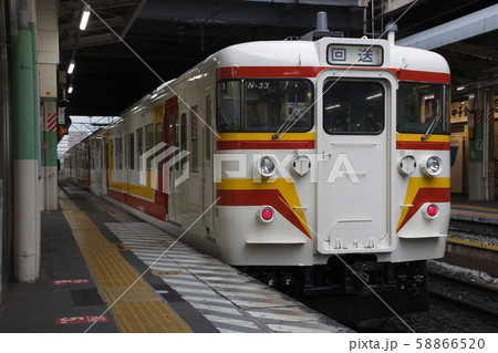 大宮から検査出場する115系（旧弥彦色） 58866520