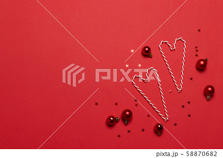 Christmas composition. Candy canes in love shape 58870682