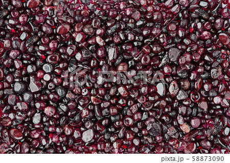 Garnet stone texture background Garnet stone texture background 58873090