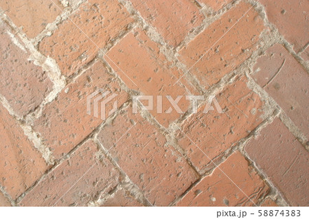 The image of a fragment of an ancient brick floor as a background 58874383
