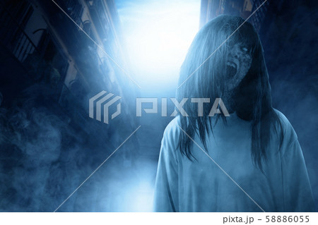 Scary ghost woman with blood and angry face 58886055