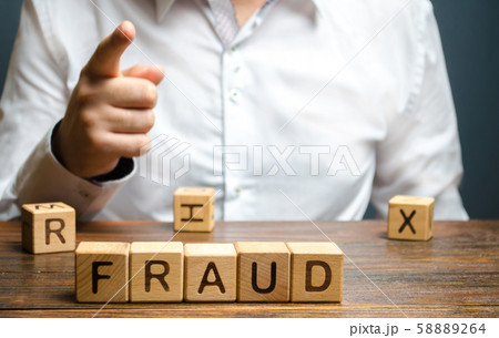 A man points a finger at a fraud. Countering deception, protection against fraudsters. The fight corruption, financial pyramids and business scams. War on crime. Cheaters A man points a finger at a fraud. Countering deception, protection against fraudsters. The fight corruption, financial pyramids and business scams. War on crime. Cheaters 58889264