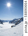 スイスの雪山と太陽 58890664