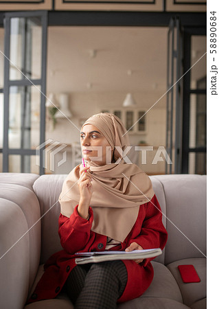 Young girl searching for motivation and inspiration 58890684