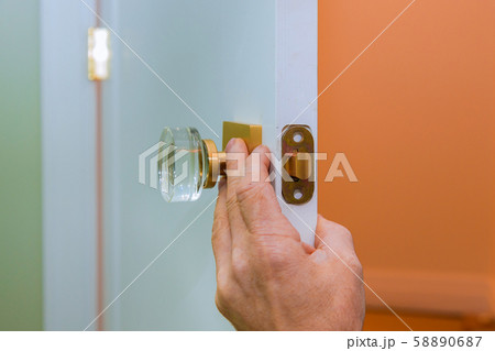 Builder in installing a door lock the door of a 58890687
