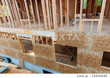 Exterior framing of new house under construction 58890688