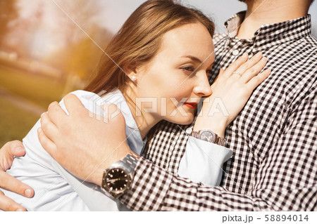 Romantic couple in the autumn park - love, relationship and dating concept 58894014