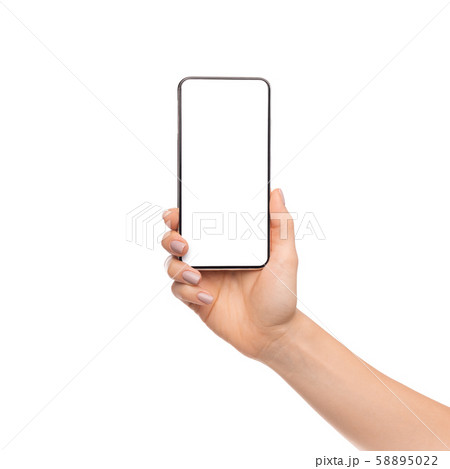 Woman's hand holding cellphone with big blank screen 58895022