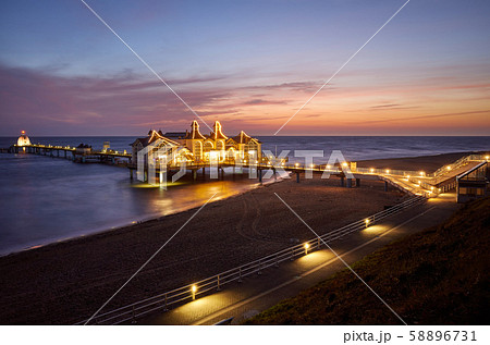 Pier in Sellin at purple dawn, Germany. 58896731