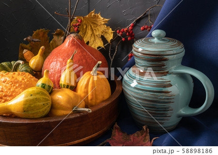 Still life with decorative pumpkins, mountain ash 58898186