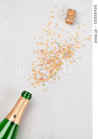 Champagne bottle and sweets holiday 58898400