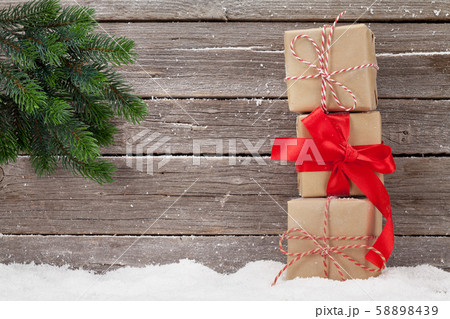 Christmas gift boxes and xmas fir tree branch 58898439