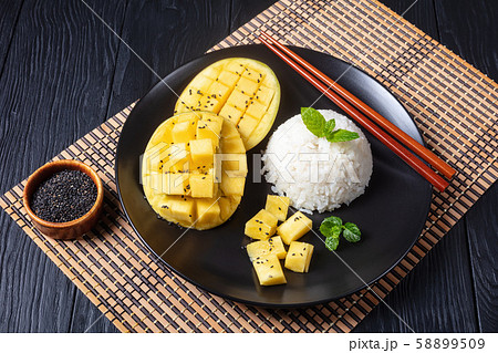 Sticky Rice With Mango on a plate Sticky Rice With Mango on a plate 58899509