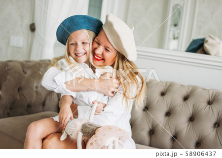 Young funny happy fair long hair mom and girl Young funny happy fair long hair mom and girl 58906437