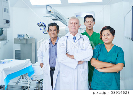 Confident multi-ethnic medical workers Confident multi-ethnic medical workers 58914623