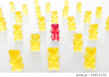 concept image, one person is not like everyone else, one red figure and many yellow concept image, one person is not like everyone else, one red figure and many yellow 58915170