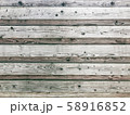 Old rustic fence with wooden texture for background in horizontal position. 58916852