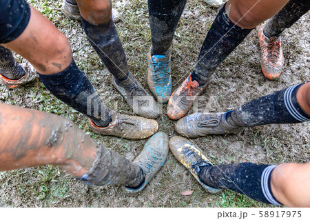 Girls soccer shoes covered with mud Girls soccer shoes covered with mud 58917975