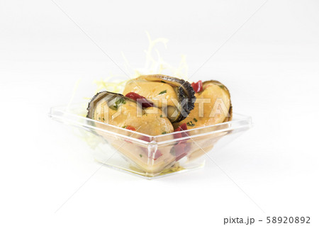 Mini snacks for buffet and banquet in a plastic bowl on a white background. 58920892