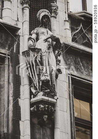 Elements of architecture and statues of the new city hall on Marienplatz in the center of Munich.  58920936