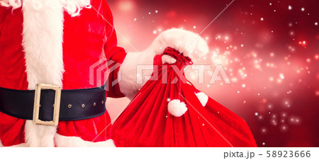 Santa holding a red sack 58923666