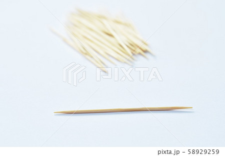 wooden toothpicks arranging on white background 58929259