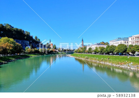 The Salzach River divides Salzburg into two districts - the left-bank pedestrian Old Town, which is 58932138