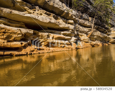 Impressive stone formations reflected on Manambolo river, Tsingy de Bemaraha Strict Nature Reserve, Madagascar  58934520