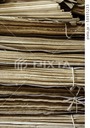 Old damaged newspapers 58935233