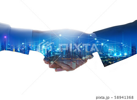 Business man handshake and network connection city 58941368